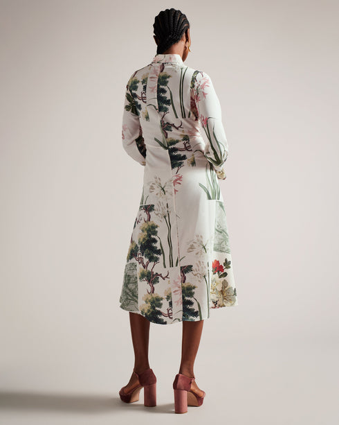 TTAYLA-Dresses-What's better than one floral print? TTAYLA. This shirt dress features our gorgeous floral collage print in a floaty easy-wearing silhouette. Midi dress Floral collage print Long shirt sleeves Waist tie Stand collar Concealed button placket Length: 126cm Ayo is 5'8" / 1.73m and wears Ivory in a Ted size 1- Ted Baker Romania
